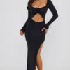 Vestito lungo con cut-out e volant Matilda in nero Vestito lungo con cut-out e volant Matilda in nero