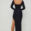 Vestito lungo con cut-out e volant Matilda in nero Vestito lungo con cut-out e volant Matilda in nero