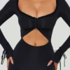 Vestito lungo con cut-out e volant Matilda in nero Vestito lungo con cut-out e volant Matilda in nero