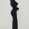 Vestito lungo con cut-out e volant Matilda in nero Vestito lungo con cut-out e volant Matilda in nero