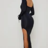 Vestito lungo con cut-out e volant Matilda in nero Vestito lungo con cut-out e volant Matilda in nero