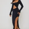 Vestito lungo con cut-out e volant Matilda in nero Vestito lungo con cut-out e volant Matilda in nero