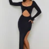 Vestito lungo con cut-out e volant Matilda in nero Vestito lungo con cut-out e volant Matilda in nero