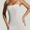Vestito lungo con orlo a fazzoletto decorato Dole in bianco Vestito lungo con orlo a fazzoletto decorato Dole in bianco