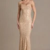 Vestito lungo con schiena scoperta e decorazioni Ariette Premium in oro Vestito lungo con schiena scoperta e decorazioni Ariette Premium in oro