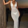 Vestito lungo con schiena scoperta e decorazioni Lanai in bianco