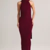 Vestito lungo con scollo all’americana e dettagli a sciarpa in maglia a coste Dree, color vino Vestito lungo con scollo all’americana e dettagli a sciarpa in maglia a coste Dree, color vino