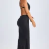 Vestito lungo con scollo all’americana e dettagli metallici Omarosa in nero Vestito lungo con scollo all’americana e dettagli metallici Omarosa in nero