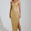 Vestito lungo con scollo rotondo e spacco sulla coscia Yarina decorato in oro Vestito lungo con scollo rotondo e spacco sulla coscia Yarina decorato in oro