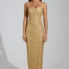 Vestito lungo con scollo rotondo e spacco sulla coscia Yarina decorato in oro Vestito lungo con scollo rotondo e spacco sulla coscia Yarina decorato in oro
