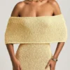 Vestito lungo con spalle scoperte Naia Bouclé in giallo Vestito lungo con spalle scoperte Naia Bouclé in giallo