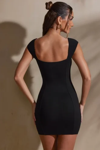 Vestito Meli con scollo a cuore e maniche ad aletta in nero