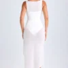 Vestito midi con collo a cappuccio e volant Deva in bianco Vestito midi con collo a cappuccio e volant Deva in bianco