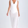 Vestito midi con collo a cappuccio e volant Deva in bianco Vestito midi con collo a cappuccio e volant Deva in bianco