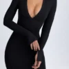 Vestito midi con scollo a V Yael in modal nero Vestito midi con scollo a V Yael in modal nero