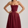 Vestito midi convertibile con orlo a palloncino e fiocco Gloriana in rosso vino Vestito midi convertibile con orlo a palloncino e fiocco Gloriana in rosso vino