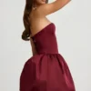 Vestito midi convertibile con orlo a palloncino e fiocco Gloriana in rosso vino Vestito midi convertibile con orlo a palloncino e fiocco Gloriana in rosso vino