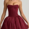 Vestito midi convertibile con orlo a palloncino e fiocco Gloriana in rosso vino Vestito midi convertibile con orlo a palloncino e fiocco Gloriana in rosso vino