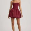 Vestito midi convertibile con orlo a palloncino e fiocco Gloriana in rosso vino Vestito midi convertibile con orlo a palloncino e fiocco Gloriana in rosso vino