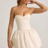Vestito midi-lungo convertibile con orlo a palloncino e fiocco Gloriana in avorio Vestito midi-lungo convertibile con orlo a palloncino e fiocco Gloriana in avorio