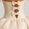 Vestito midi-lungo convertibile con orlo a palloncino e fiocco Gloriana in avorio Vestito midi-lungo convertibile con orlo a palloncino e fiocco Gloriana in avorio
