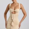 Vestito Zivanka in jersey elasticizzato con cut-out e bordi arricciati in color crema Vestito Zivanka in jersey elasticizzato con cut-out e bordi arricciati in color crema