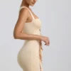 Vestito Zivanka in jersey elasticizzato con cut-out e bordi arricciati in color crema Vestito Zivanka in jersey elasticizzato con cut-out e bordi arricciati in color crema