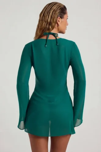 Vista Vestito corto trasparente con collo a cappuccio impreziosito da perline in verde giada